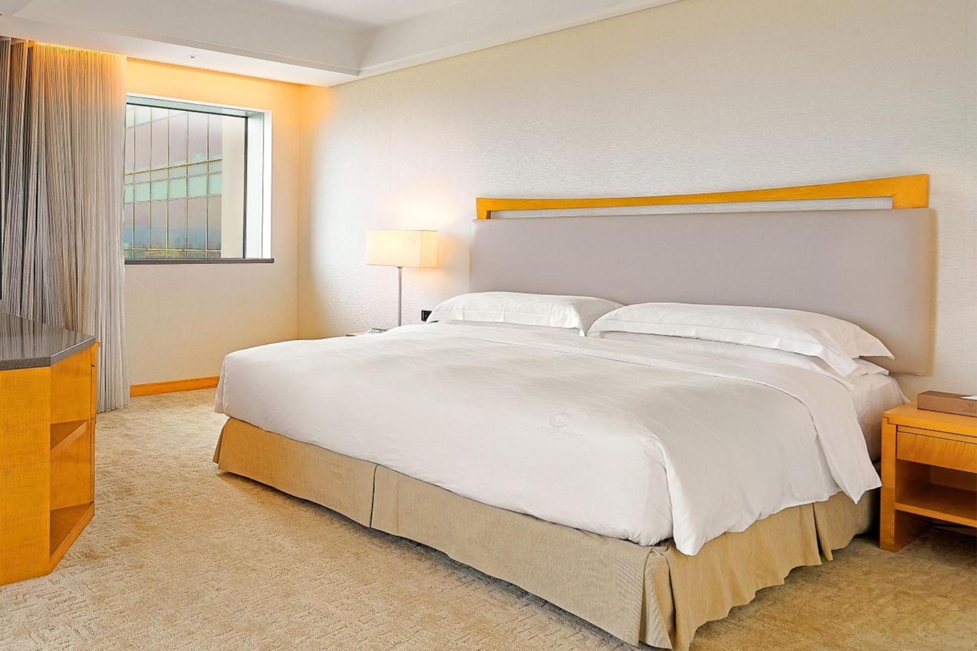 Windsor Hotel Taichung Chambre photo A bedroom at the hotel